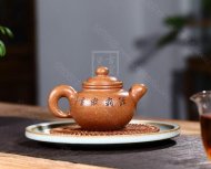 《掇球經霜傲雪灑金》